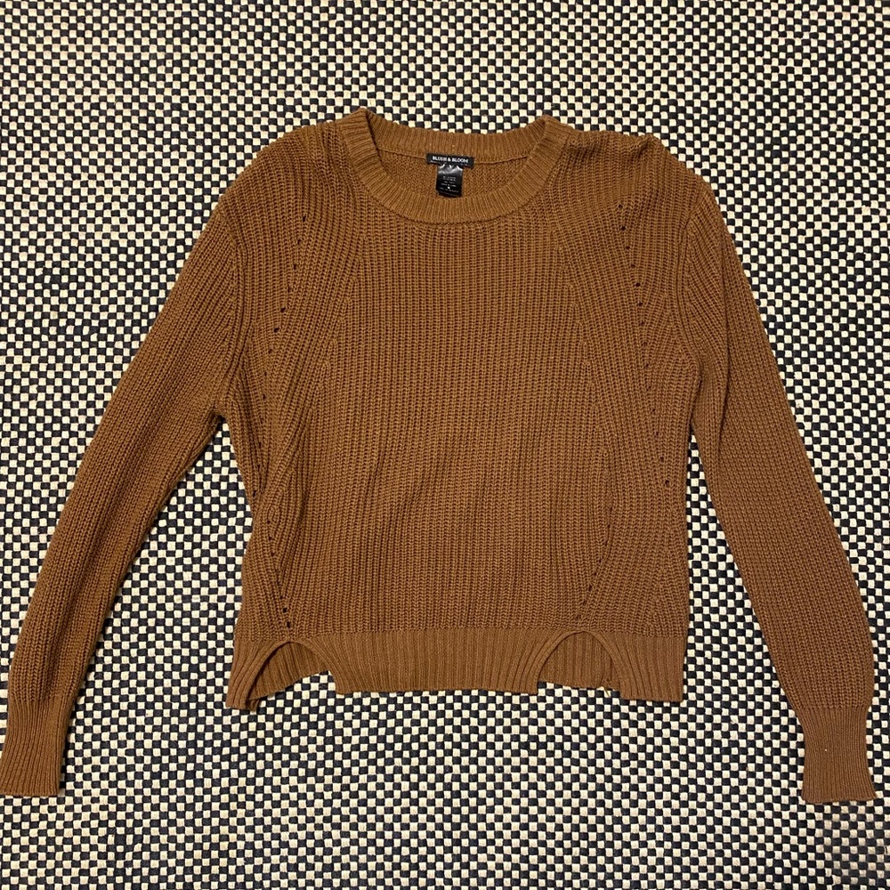Brown knit sweater with zip up back.